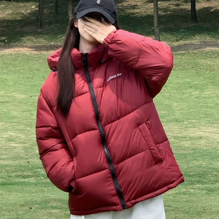 Dame Veste matelassée thermoisolante avec capuche ajustable et poches latérales Chic und Stil