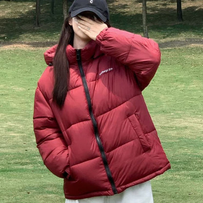 Dame Veste matelassée thermoisolante avec capuche ajustable et poches latérales Chic und Stil