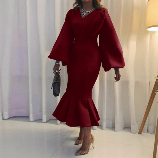 Robe ajustée pour femmes avec des manches volumineuses et un ourlet flottant Chic und Stil