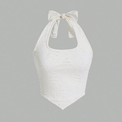 Haut de maillot de bain pour femme à encolure halter avec un détail de nœud ludique et un tissu texturé Chic und Stil