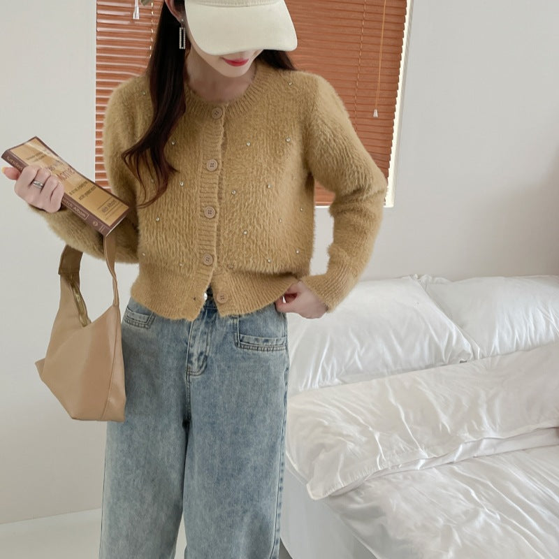 Dames élégante cardigan en tricot avec des accents de perles tendance Chic und Stil