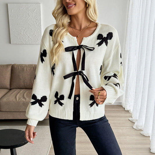 Pull femme avec motif de nœuds et coupe confortable Chic und Stil