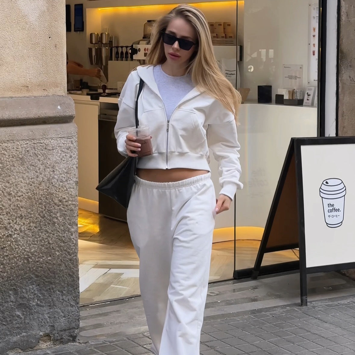 Ladies casual short hooded sweatshirt with elastic hem and comfortable jogger pants Chic and Style