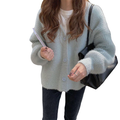 Dames cardigan douillet avec des détails de boutons modernes et une coupe oversized Chic und Stil