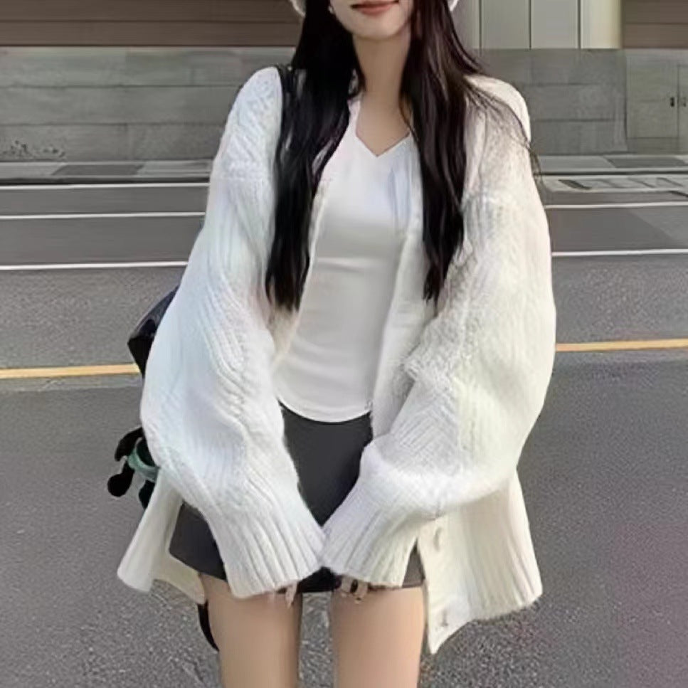 Dames gros tricot cardigan avec des manches surdimensionnées et de grands détails de bouton Chic und Stil