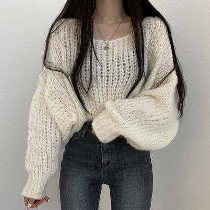 Pull en tricot décontracté pour femmes avec des manches bouffantes volumineuses et une structure en tricot ouverte Chic und Stil