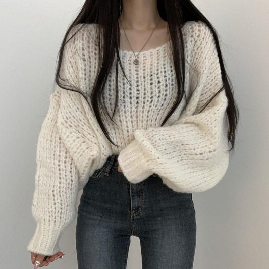 Pull en tricot décontracté pour femmes avec des manches bouffantes volumineuses et une structure en tricot ouverte Chic und Stil