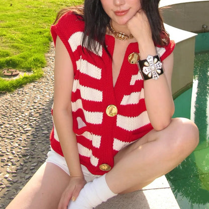 Dame gilet en maille avec de larges rayures et de gros boutons Chic und Stil