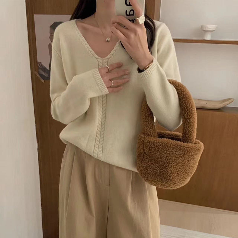 Pull en tricot pour femmes avec décolleté en V et motif torsadé Chic und Stil