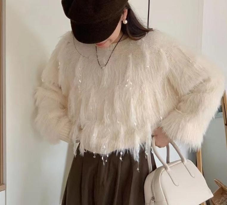 Fuzzy knit sweater for women with unique details Chic and Style