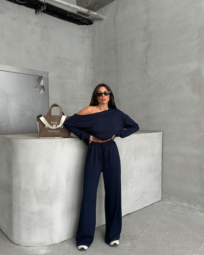 Combinaison décontractée pour femmes avec des jambes larges et un design off-shoulder Chic und Stil