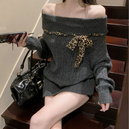 Pull en grosses mailles pour femmes avec épaule dénudée et accent de nœud ludique Chic und Stil