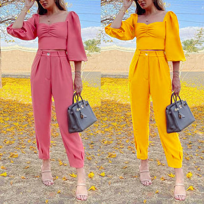 Two-piece set for women with puff sleeves and elegant high-waisted pants Chic und Stil