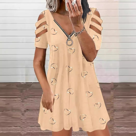 Robe de loisirs pour dames avec des manches à découpe et un motif en forme de cœur Chic und Stil