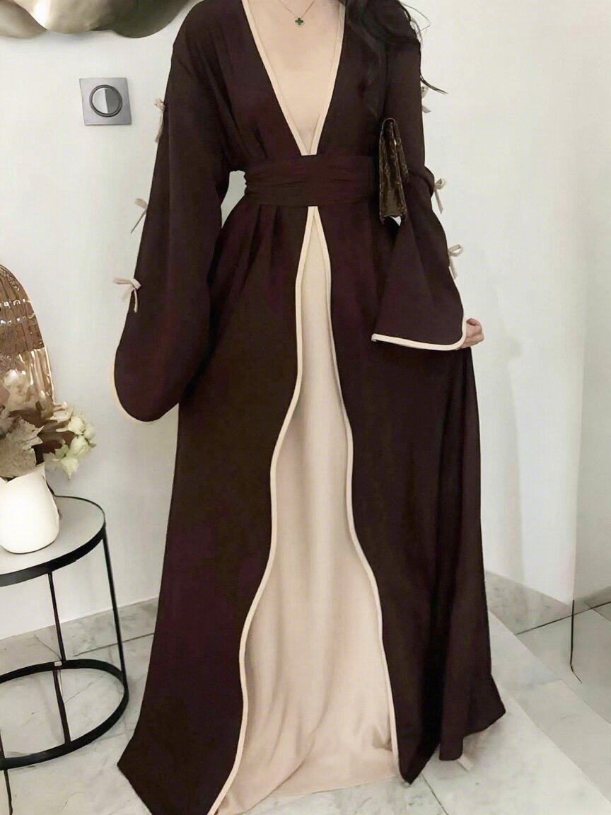 Robe maxi femme avec des détails de nœud élégants et une coupe fluide Chic und Stil