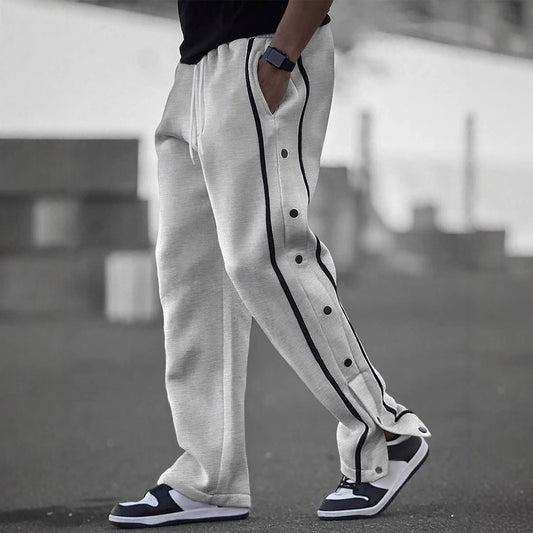 Stylish men's sports pants with snap button details and side pockets Chic and Style