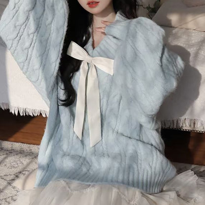 Dames Grand pull en tricot avec détail en noeud et motif en torsades Chic und Stil