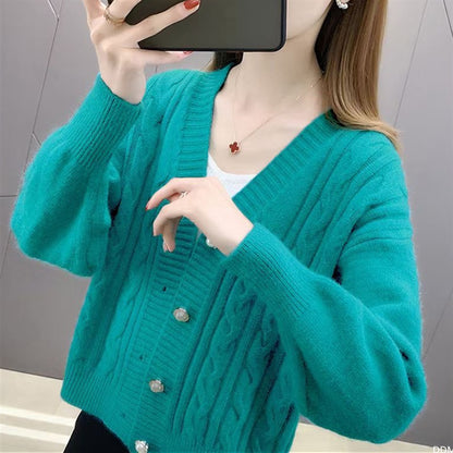 Knitted jacket for women with an elegant braid pattern and high-quality button details Chic and Style