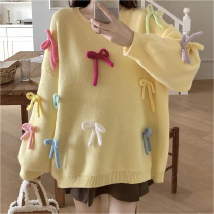 Pull décontracté pour femmes avec des appliqués de nœuds ludiques Chic und Stil