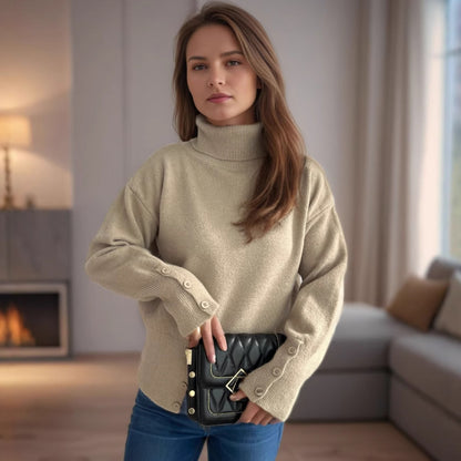 Pull col roulé tendance pour femmes avec détails de boutons et ourlet asymétrique Chic und Stil