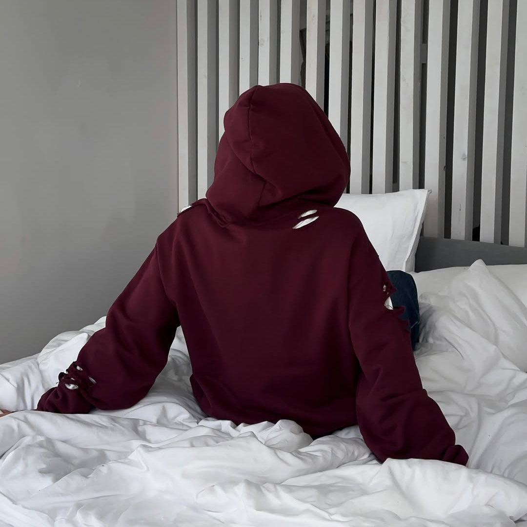 Pull à capuche oversize pour femmes avec des détails de déchirure tendance Chic und Stil