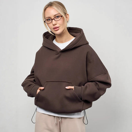 Pull à capuche oversized pour femmes avec une coupe décontractée et une poche kangourou pratique Chic und Stil