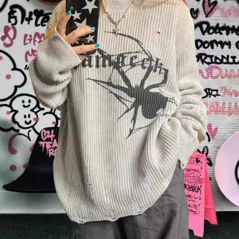Pull en maille surdimensionné pour femmes avec un motif de araignée frappant Chic und Stil