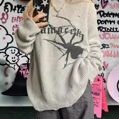 Pull en maille surdimensionné pour femmes avec un motif de araignée frappant Chic und Stil