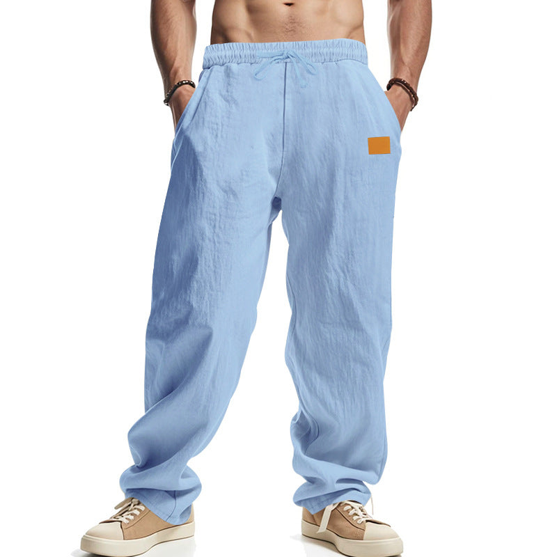 Linen pants for men with a relaxed fit featuring an adjustable drawstring and practical side pockets Chic and Style