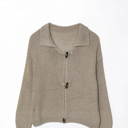 Women's knit jacket with elegant buttons and textured surface Chic und Stil