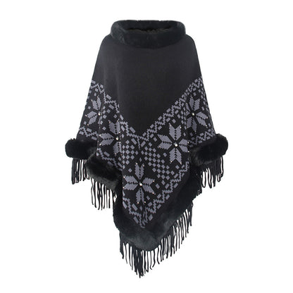 Elegant women's poncho with decorative fringe design and faux fur trim Chic and Style