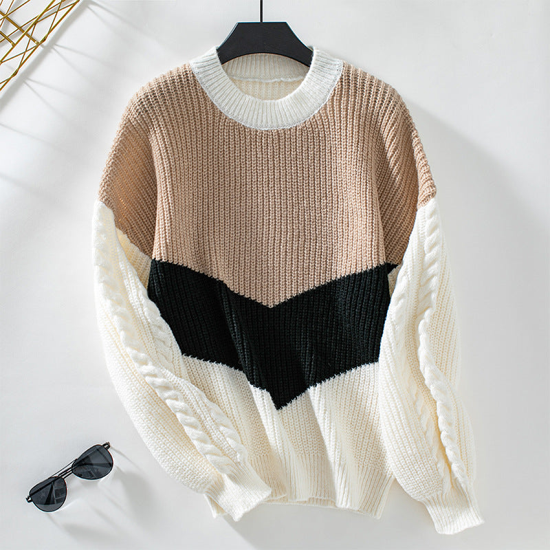 Pull en maille tendance pour femmes avec des manches à motif torsadé raffiné et des couleurs contrastées Chic und Stil