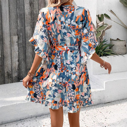 Robe portefeuille pour femmes avec motifs floraux et manches aérées Chic und Stil