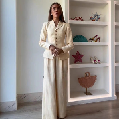 Elegant suit set for women with fitted jacket and wide-leg pants Chic and Style