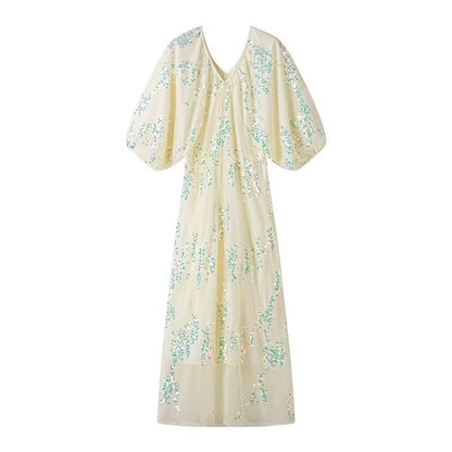 Robe maxi pour femmes avec de volumineuses manches bouffantes et un design en strass floral Chic und Stil