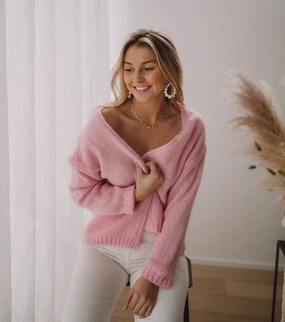 Pull léger pour femmes avec épaule dénudée et motif tricot doux Chic und Stil