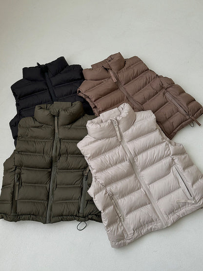 Dames gilet matelassé avec cordon de taille ajustable et poches pratiques Chic und Stil