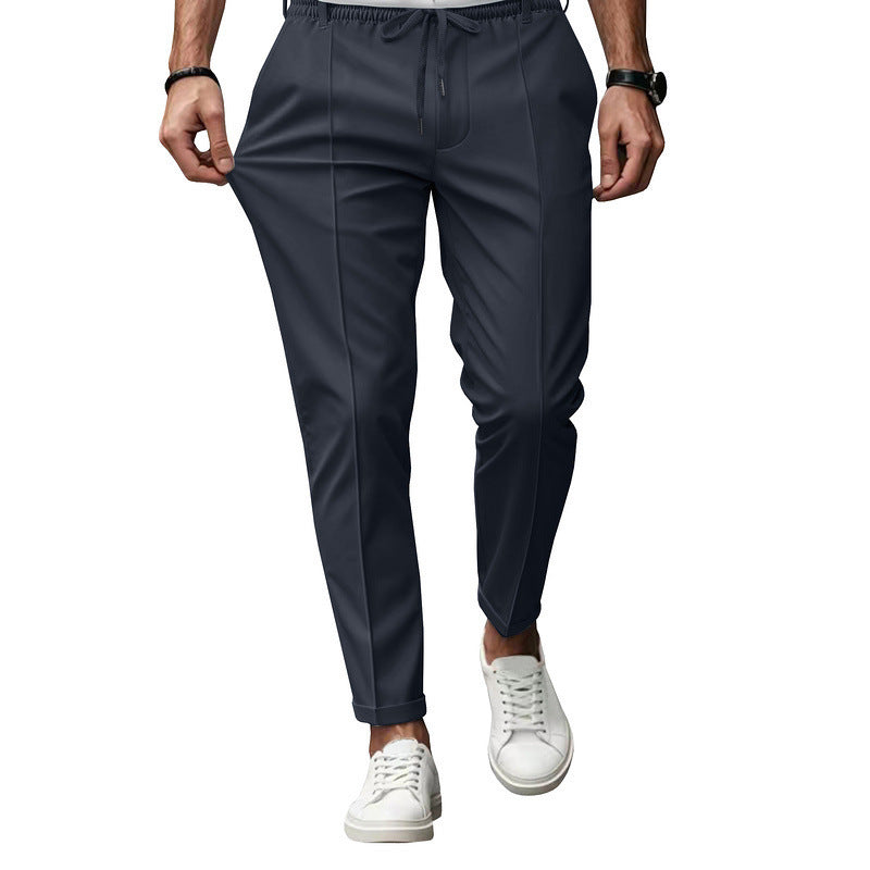 Men's fashionable sports pants with elastic waistband and practical welt pockets Chic and Style