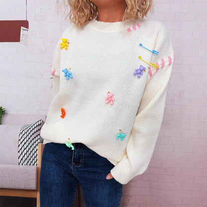Pull femme avec motif de ours ludique et appliqués décoratifs Chic und Stil