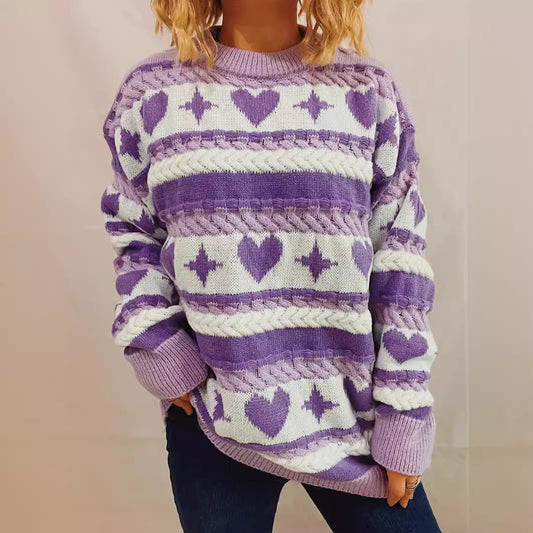 Pull en gros tricot pour femmes avec un motif de cœur ludique et des détails en torsades Chic und Stil