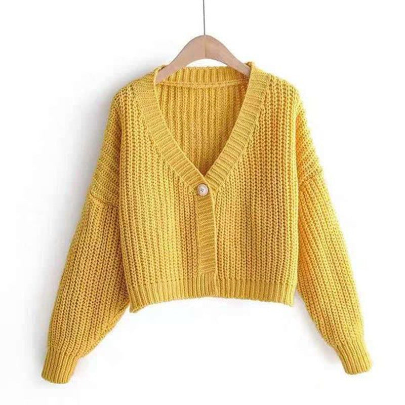 Cardigan court en tricot pour femme avec décolleté en V et détails de boutons tendance Chic und Stil
