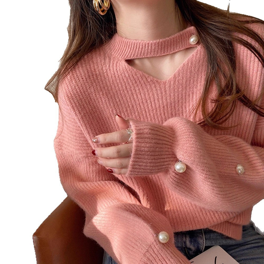 Pull en tricot pour femmes avec un look cut-out raffiné et des manches ornées de perles Chic und Stil