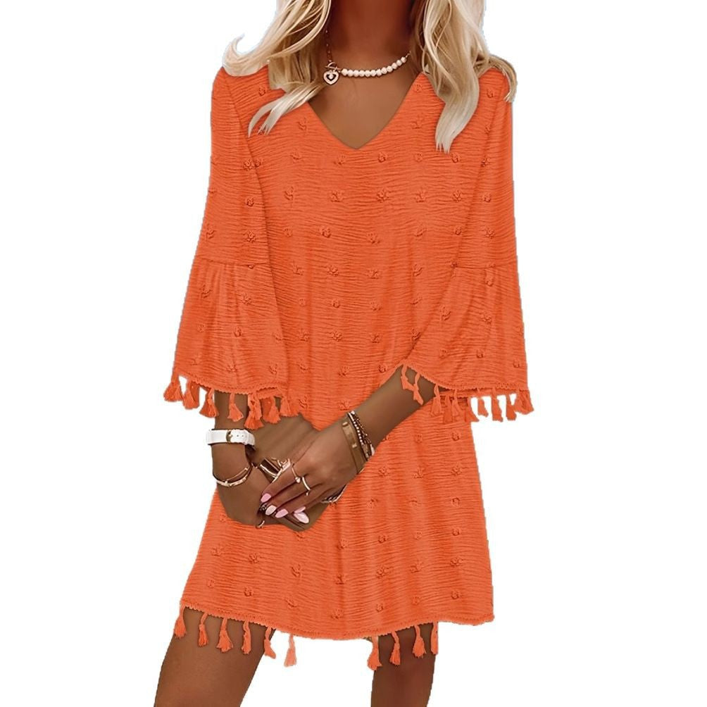 Robe de plage pour femmes avec un élégant décolleté en V et des franges décoratives Chic und Stil