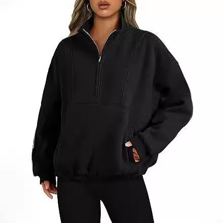 Oversized fleece pullover for women with a high collar and side pockets Chic und Stil
