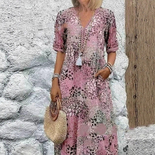 Robe maxi femme avec décolleté en V et poches latérales pratiques Chic und Stil