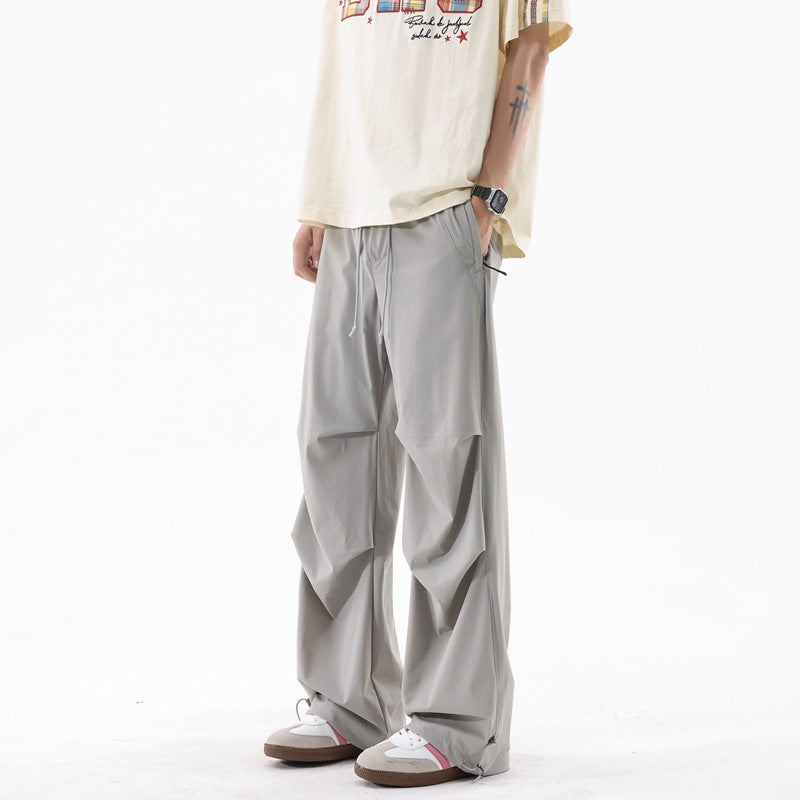 Loose sports pants for men with a remarkable draped design Chic and Style