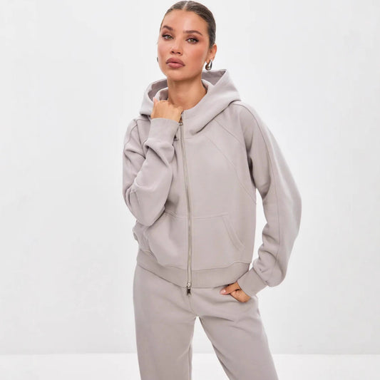 Chic and Style women's sporty hoodie and jogger pants set with fashionable zipper