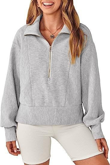 Pull sportif pour femmes avec col montant et demi-zip Chic und Stil