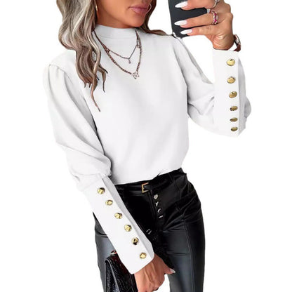 Blouse élégante pour femmes avec des manches bouffantes et des détails de boutons dorés Chic und Stil