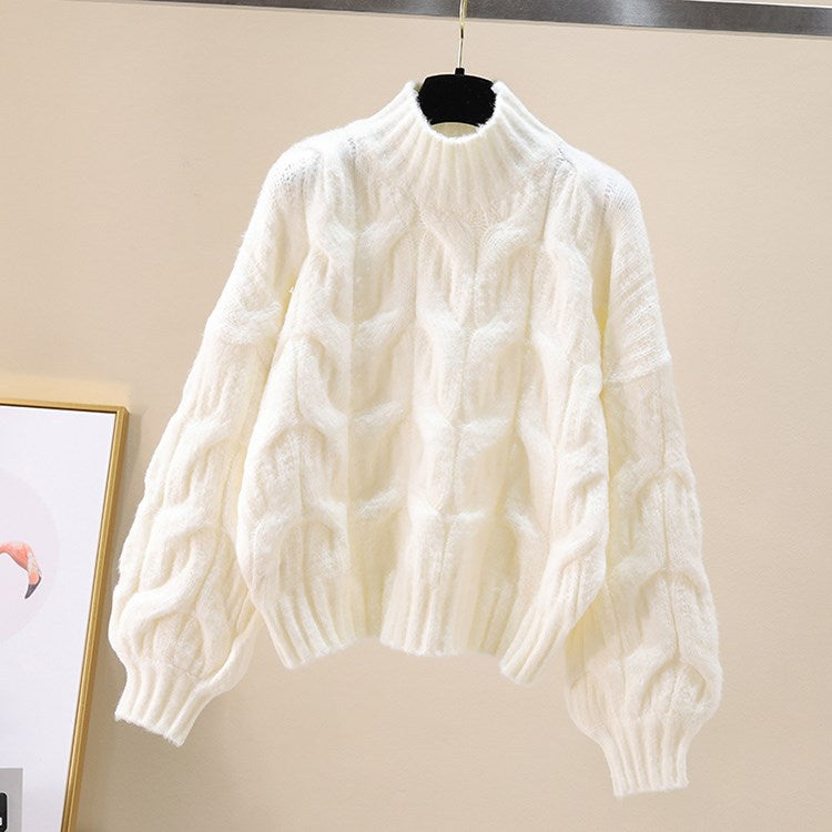 Pull en tricot confortable pour femmes avec des manches volumineuses et un motif torsadé Chic und Stil